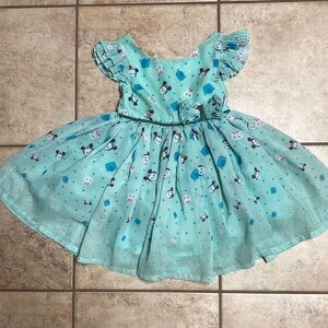 Disney Tsum Tsum dress fully-lined.